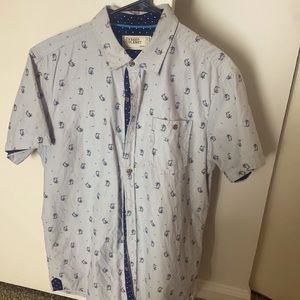 Gray with a navy blue backing . Large In size.